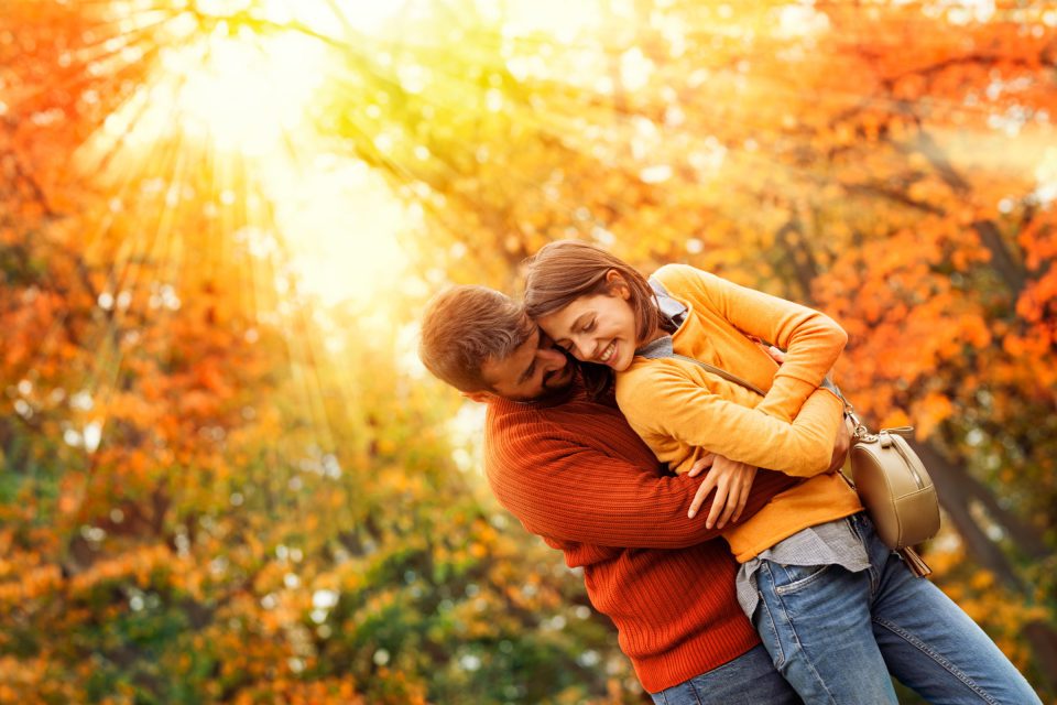 Beautiful Couple In Love On A Walk In Autumn Forest